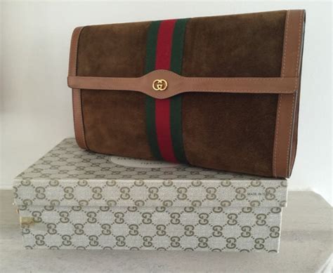 vintage gucci suede clutch|gucci handbags from 1980s.